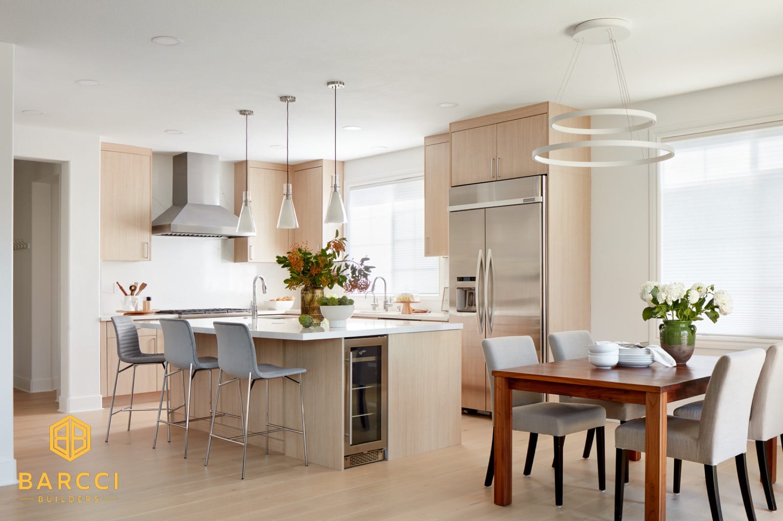 Side-by-side comparison of a detached ADU and a JADU conversion in a Bay Area backyard showing the key differences between ADU vs JADU in California